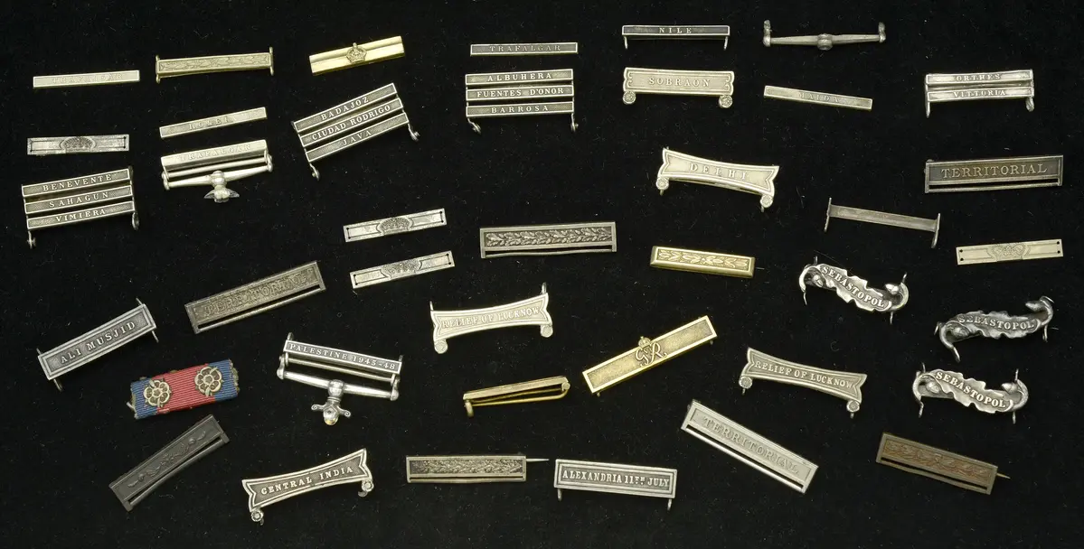 Clasps: A selection of miscellaneous clasps, Second Award bars, and