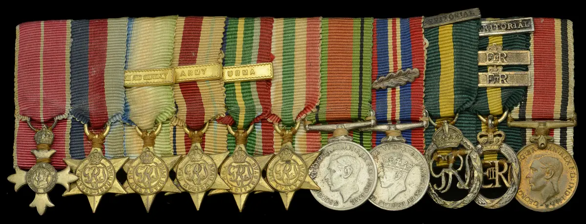 A Second War O.B.E. mounted group of eleven miniature dress medals