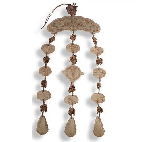 A CHINESE JADE HANGING ORNAMENT 18TH CENTURY 青白玉衣饰挂件 十八世纪 co...