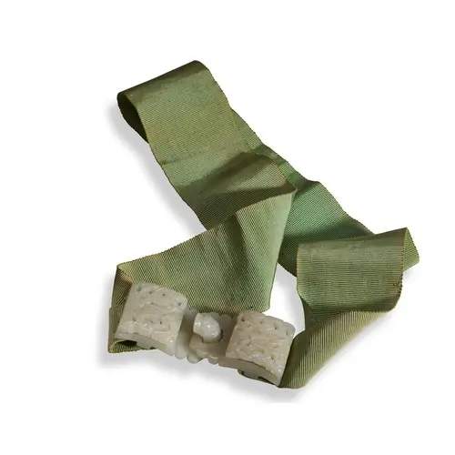 A CHINESE JADE OPENWORK DOUBLE BELT BUCKLE 18TH CENTURY 白玉龙纹...