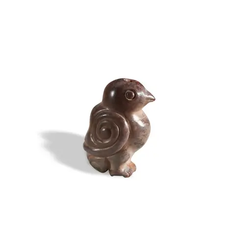 A CALCIFIED ARCHAIC-STYLE 'BIRD' PENDANT QING DYNASTY, 19TH ...