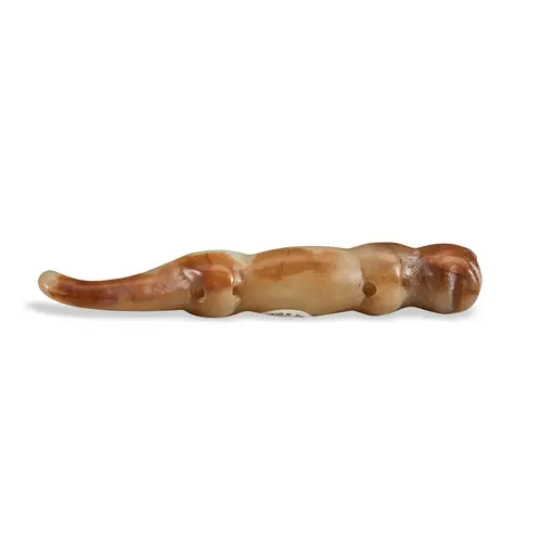 A YELLOW AND RUSSET JADE 'CAT' ORNAMENT MING DYNASTY OR EAR...
