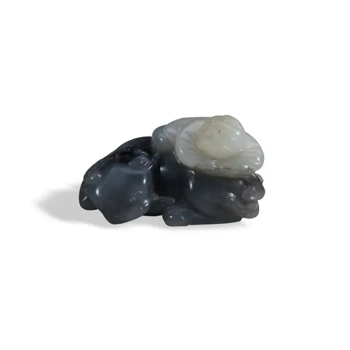 A GREY AND WHITE JADE BUFFALO AND BOY GROUP QING DYNASTY, 19...