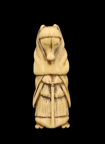 Carved Bone Netsuke of a Fox Disguised as a Priest