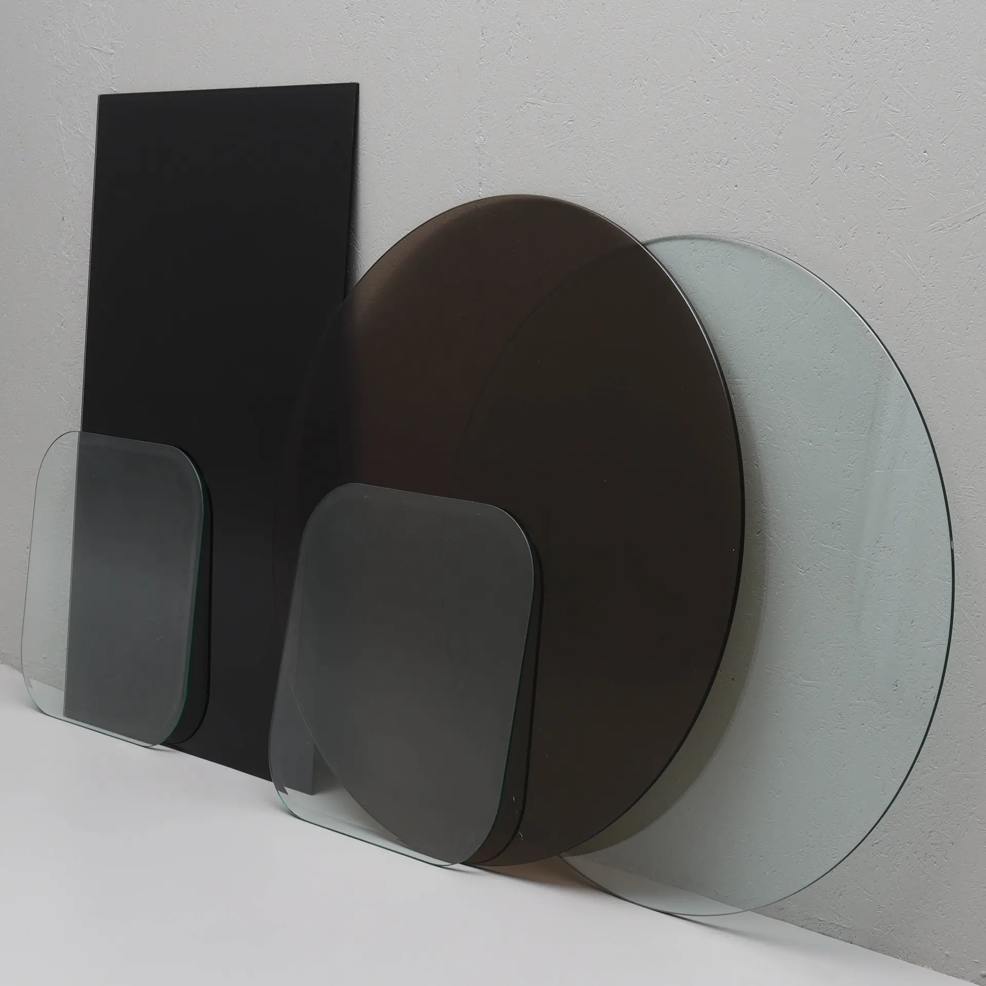 SAMLING BORDSSKIVOR, glas, 5 delar.