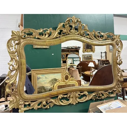 A 19TH CENTURY ITALIAN GILTWOOD WALL MIRROR 130cm x 94cm ...