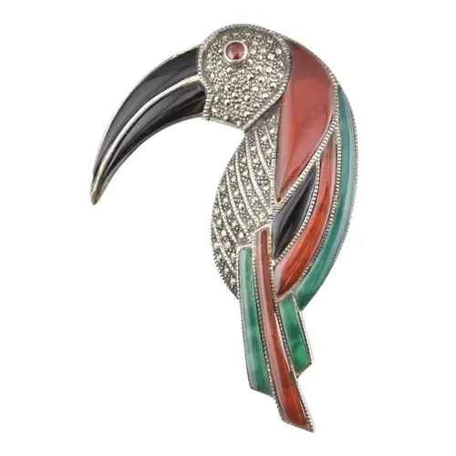 A silver, enamel and white stone exotic bird brooch pin. A s...