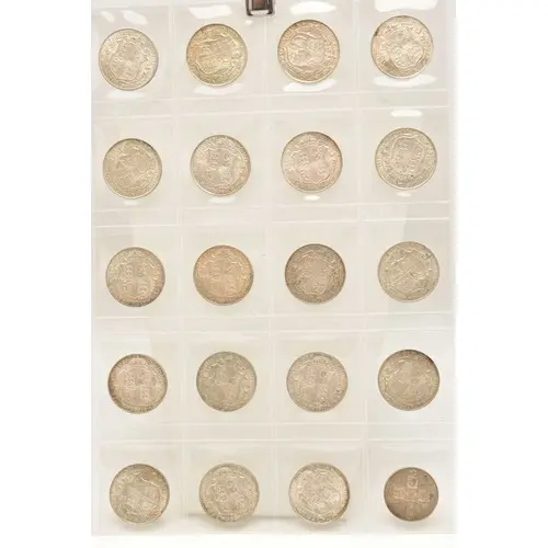 Silver. A page from a coin album containing 19 x King George...