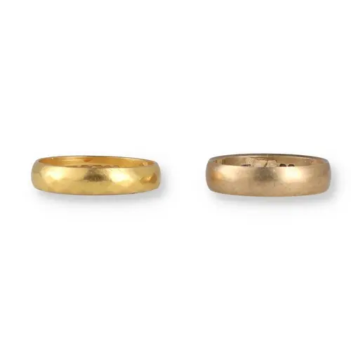 TWO GOLD WEDDING BANDS (2) Total weight: 5.6gms ...