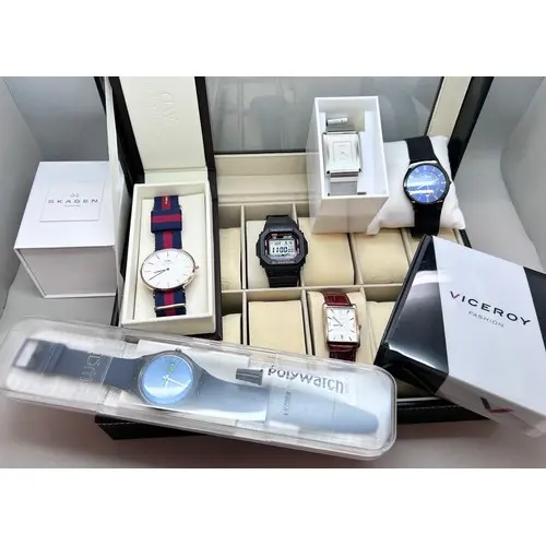 A collection of wristwatches including Swatch, Daniel Wellin...