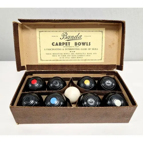 Boxed set of Banda vintage carpet bowls