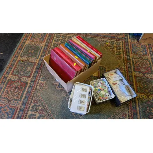 Collection of loose world stamps + 13 x empty stamp albums
