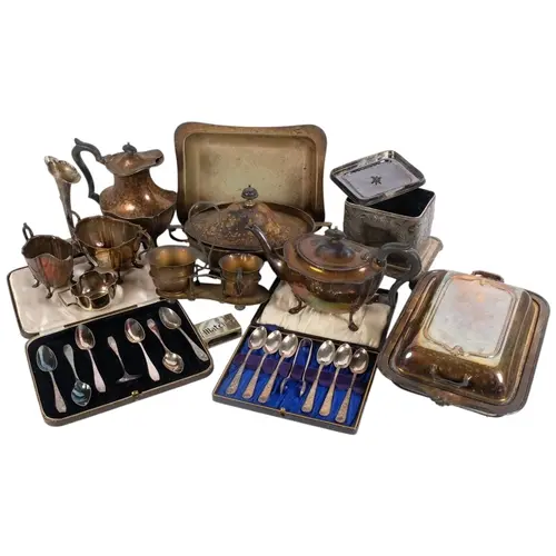 A large collection of silver plated items, including teapot,...