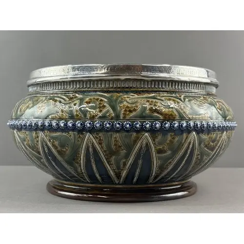 Ceramics: a Doulton Lambeth stoneware salad bowl with silver...