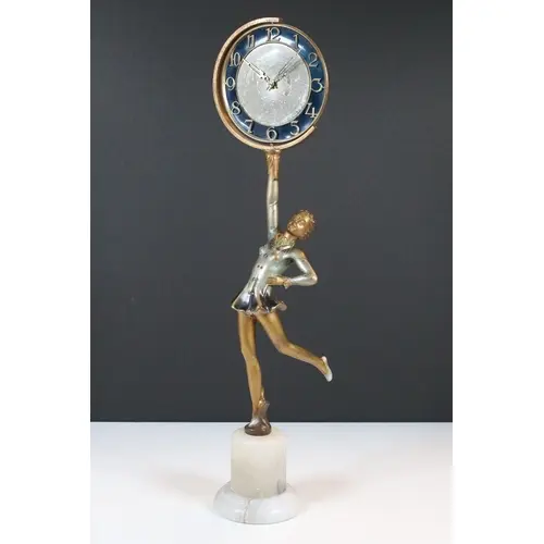 Art Deco figural clock, modelled as a woman holding the circ...