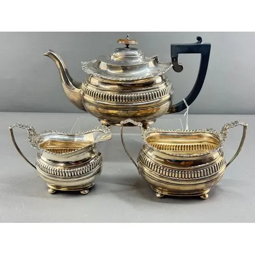 Silver: a three piece teaset by S Blanckensee & Son Ltd,...