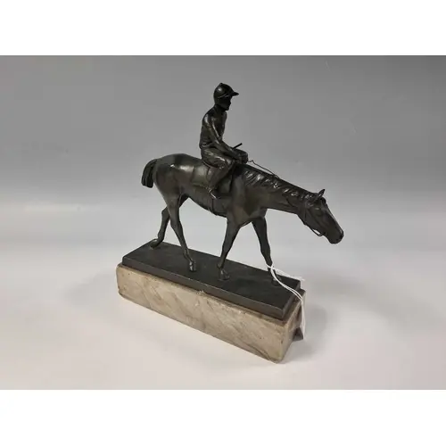 A VINTAGE CAST BRONZED SPELTER EQUESTRIAN GROUP depicting a ...