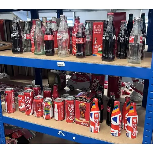COCA COLA MEMORABILIA TO INCLUDE CANS AND BOTTLES SOME SEALE...