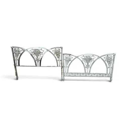 AN ART NOUVEAU DECORATIVE METAL BEDHEAD AND FOOTER 138cm x 1...