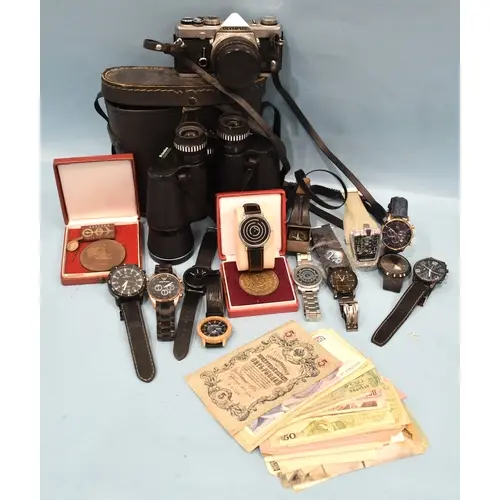 An Olympus OM-1 MD 35mm SLR camera with G Zuiko Auto-S 1:1.4...