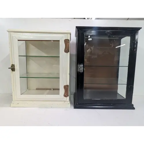 Two vintage metal painted display cabinets with glass shelve...