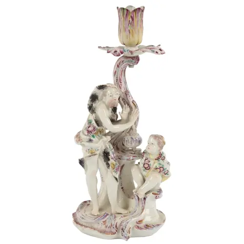 An early Derby porcelain figural candlestick emblematic of W...