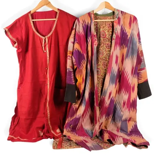 An Uzbek ikat chapan traditional silk and cotton robe, and a...