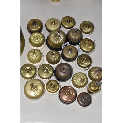A COLLECTION OF VINTAGE BRASS WALL MOUNTED LIGHT SWITCHES to...