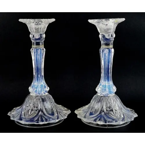 Pair of opaline glass candlesticks, each 18cm high.
