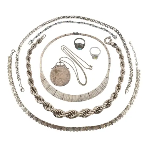 A collection of silver white metal & metal jewellery. Th...