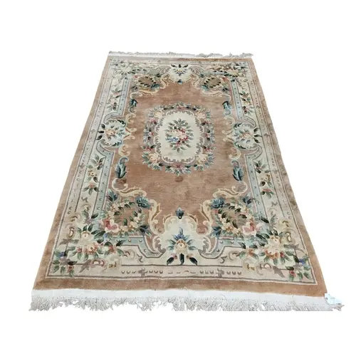 A cream and brown ground Rug with multi borders and central ...