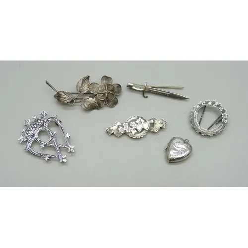 A collection of silver and white metal jewellery including a...