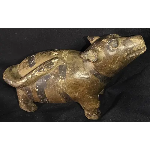 A South American antique figure of a four legged animal, len...