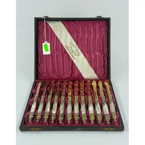 Silver: an early 20th century cased set of 12 mother of pear...