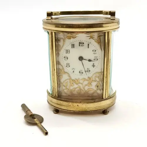 Antique 19thC French oval carriage clock with enamelled dial...