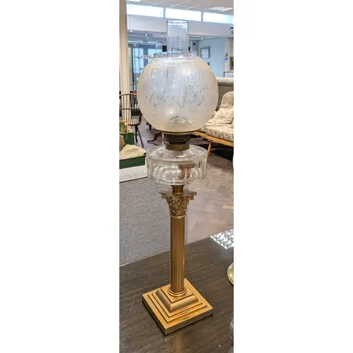 A Victorian brass Corinthian column oil lamp with glass bowl...