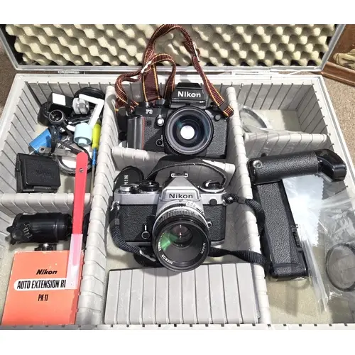 Nikon F3 vintage SLR camera with Nikkor 35mm lens, A Nikon F...