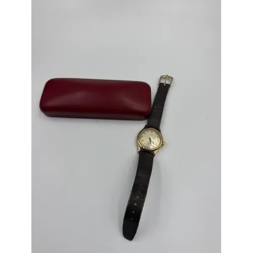 An early 1960's Majex 17 jewels 9ct gold engraved watch on l...