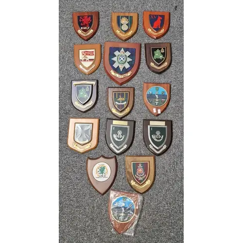 Collection of military regimental and unit shields and crest...