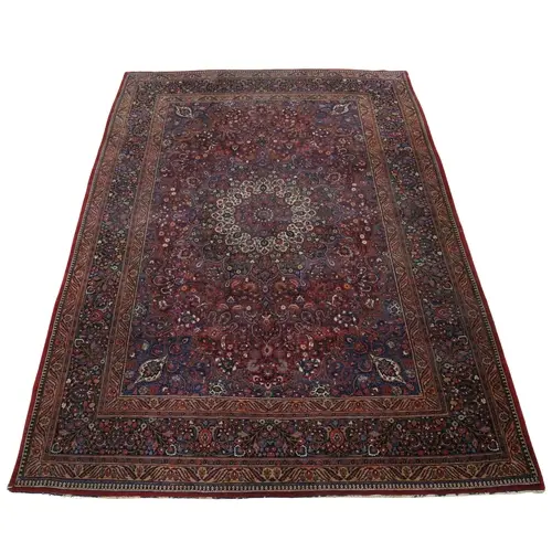 A MASHAD CARPET, KHORASAN, CIRCA 1925. The raspberry field r...