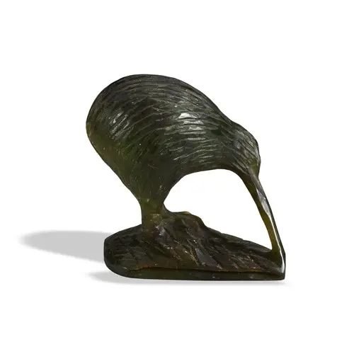 A GREEN HARDSTONE (KAWAKAWA) CARVING OF A KIWI BIRD FROM NEW...
