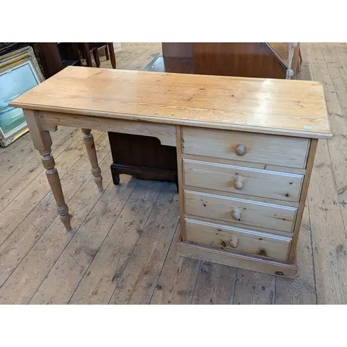 A single pedestal desk fitted four drawers, 4' wide