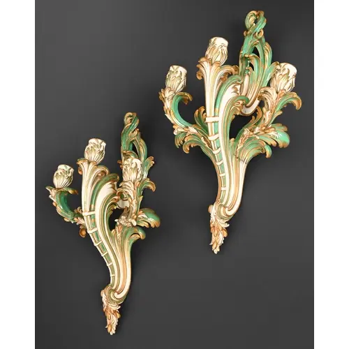 A pair of Minton rococo style three-light wall sconces, afte...
