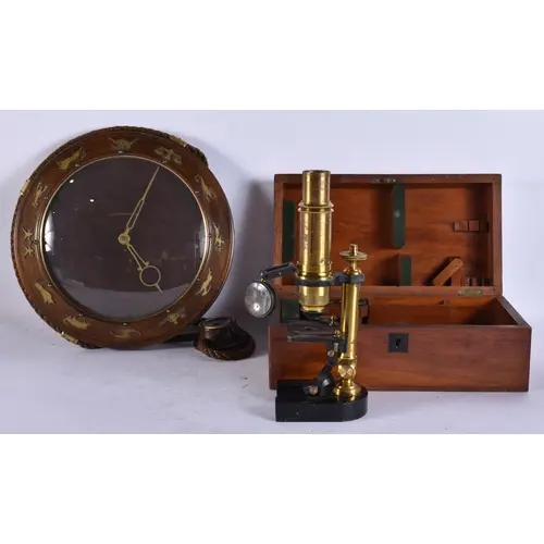 A VINTAGE CLOCK together with a microscope. (2)