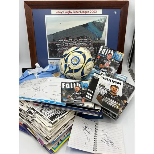 A collection of sporting memorabilia to include four signed ...