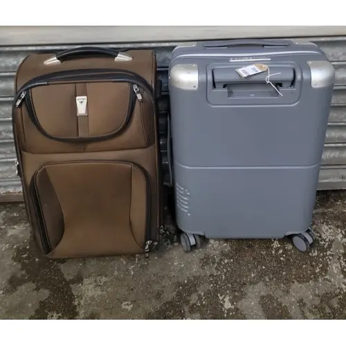 TWO SUITCASES INC. ANTLER Note: cases and bags are empty