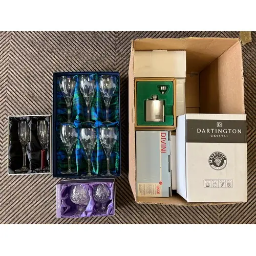 Assorted boxed crystal glasses, with wine glasses.