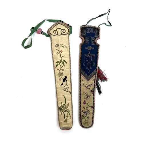 Two Chinese antique silk fan cases, one embroidered in peki...