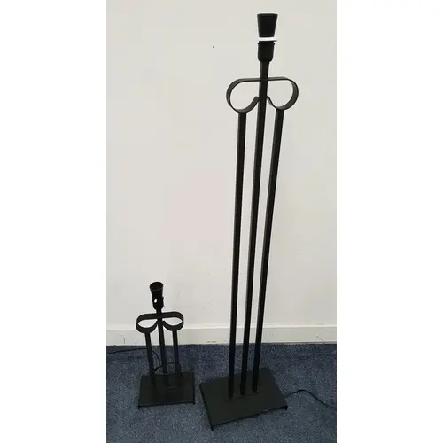 PAIR OF CONTEMPORARY LAMPS both of black painted cast metal ...