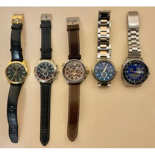 Watches - A collection of varied wristwatches, housed by dif...